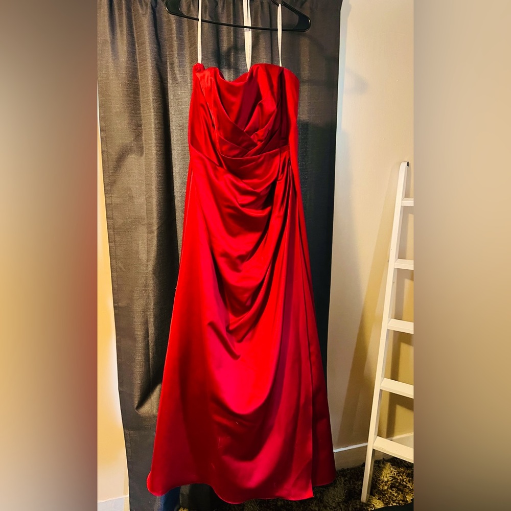 Strapless red dress, floor length.